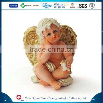 Handmade little boy angel figurine
