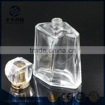 Luxury 100ml clear glass perfume bottle with decorative cap