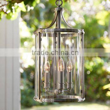 11.29-22 modern and traditional candlestick style lights set within a column of clear glass pendant lamp