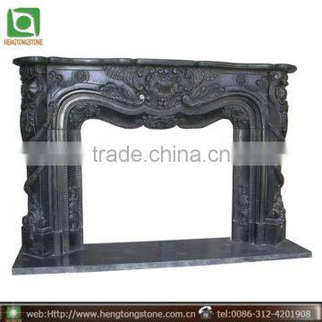 Cheap Black Marble Fireplace Mantel with Flower Carving