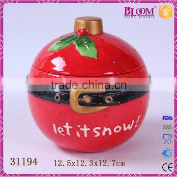 Funny round red ceramic christmas cookie jar