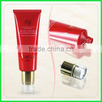 100ml glossy round red plactic cosmetic tube with pump lid