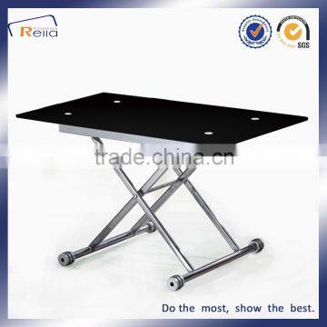 Space saving foldable glass dining table