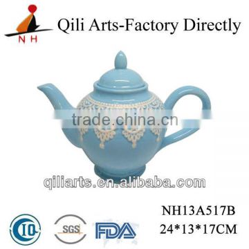 delicate ceramic teapot glazed blue