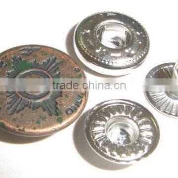 four parts rusty metal snap button