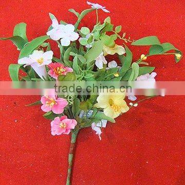 An Attractive Mixed Flowers Bush in Shades of Pink Yellow and Cream,mixed flowers bush