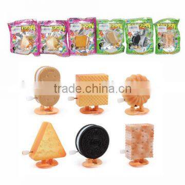 FUNNY WIND UP COOKIE CANDY TOY Y2770546