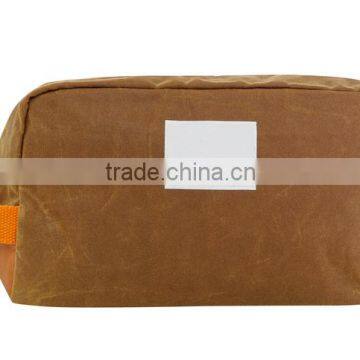 Custom khaki waxed canvas dopp kit with leather trim