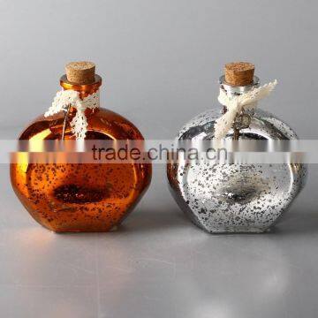 cosmetic glass bottle with cork and decoration