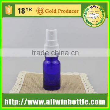 blue glass bottle with plastic spray cap for cosmetic packing