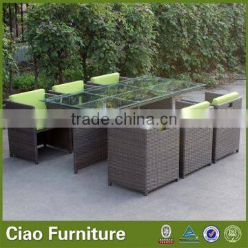 Space saving rattan cube dining table and 6 chairs