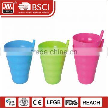 Plastic ice cream cup with straw