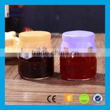 Wholesale 100ml milk pudding bottle glass jam jar with safe silicone cap