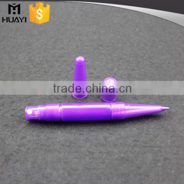 empty purple color plastic pen perfume bottle