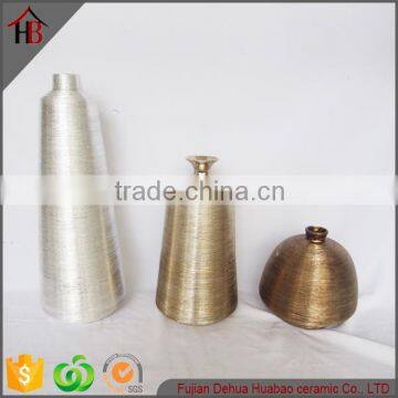 Grind arenaceous ceramic vase electroplating style