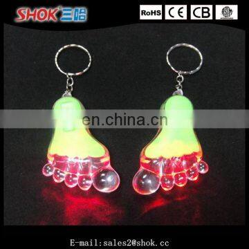 Wholesale promotion item foot shape flashing led keychain