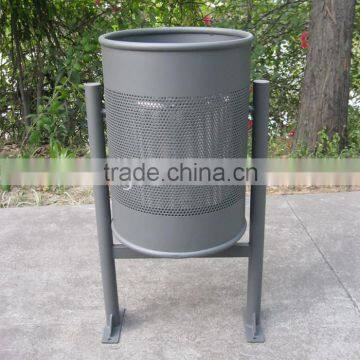 Tilting forward steel garbage bin stand outside dustbins