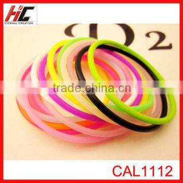 wholesale 2014 top sell colorful glowing silicone bracelets china make rubber band bracelet