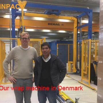 In-line Automatic Rotary Arm Pallet Stretch Ring Wrapping Machine For Bags photo-3