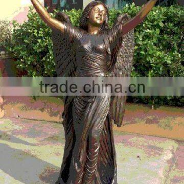 Bronze freedom girl with wing sculpture