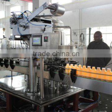 Milk filling and aluminum foil sealing machine