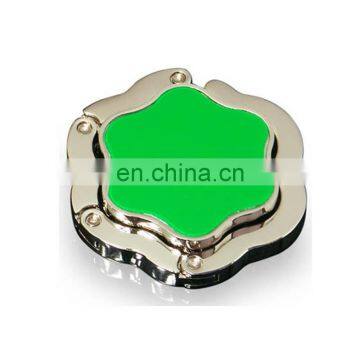 all kinds of types bag hanger holder hook,clear epoxy logo hanger bag for table