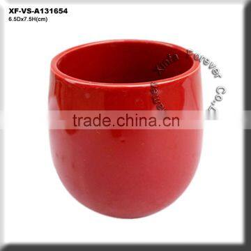 glazed red ceramic planting pot