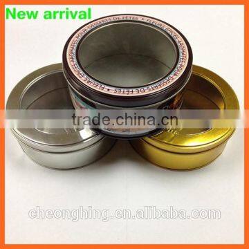 round tin box with window lid