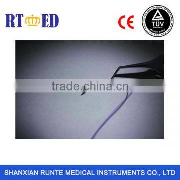 Surgical synthetic braided PGA suture with reverse cutting needle