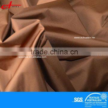 laminated 100% polyester fabric with 75D Plain Mechanical Spandex