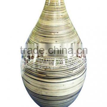 Round spun bamboo and coconut vase with natural material, color