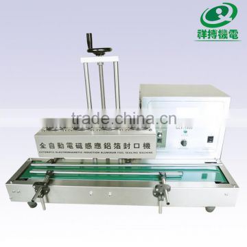 High speed pet bottle aluminum foil sealing machine