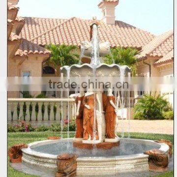 Large stone garden fountain with lady statues