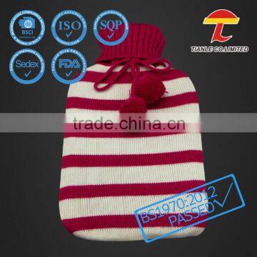 Striped knitted cover with rubber hot water bottle