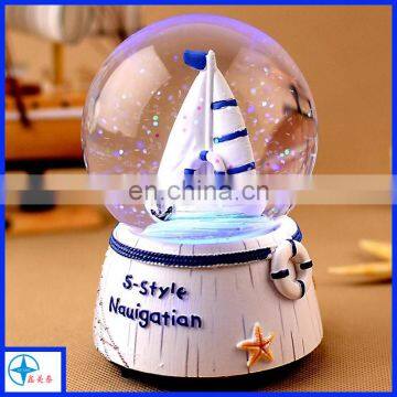 resin sailing ship snow globe