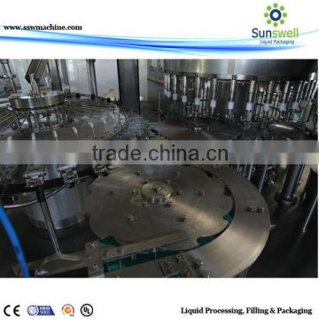 Mineral water filling and sealing machine