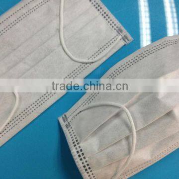 white green disposable face mask