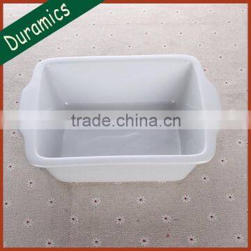 Large rectangular ceramic baking dish with handle