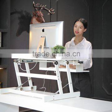 Height adjustable stand up desk with keyboard tray