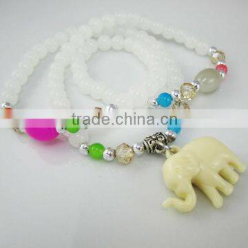 Colorful glass bracelet with elephant pendant