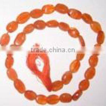 Carnelian plain oval beads 6x8mm