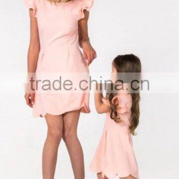 High Quality Pink Ruffles Sleeves Mommy And Baby Matching Short Frock Designs Dress Women Casual photo-2