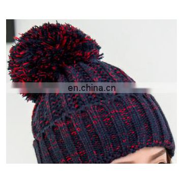 Stripped polyester beanie hat with bobble and inside fleece section