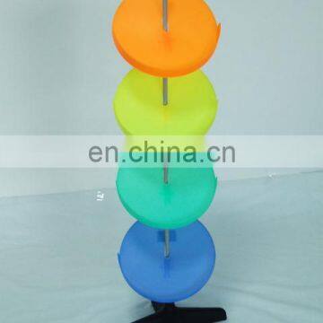 Colourful plastic round shoe rack