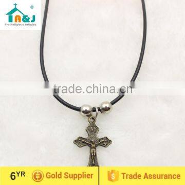 Catholic Antique brass cross cord pendant