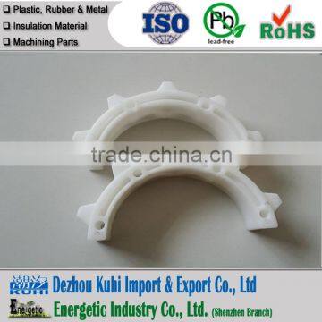 White plastic gear with shaft mounted