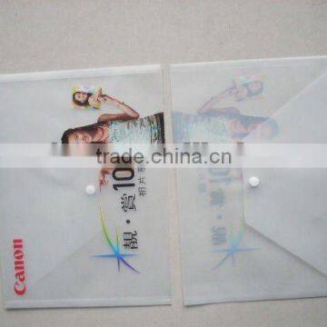 Advertising gift - A4 plastic folder with button