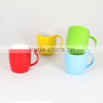 Glazed spraying ceramic mugs and cups in different colors