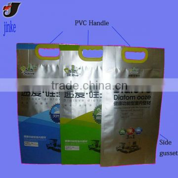 Plastic bag with PVC handle