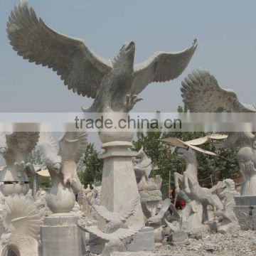 hand-carved eagle stone sculptures